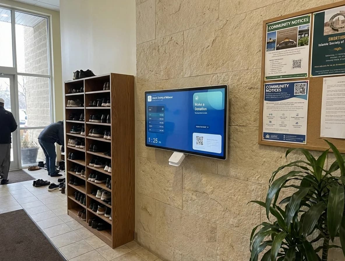 Freestanding Givebear donation kiosk in a church hallway